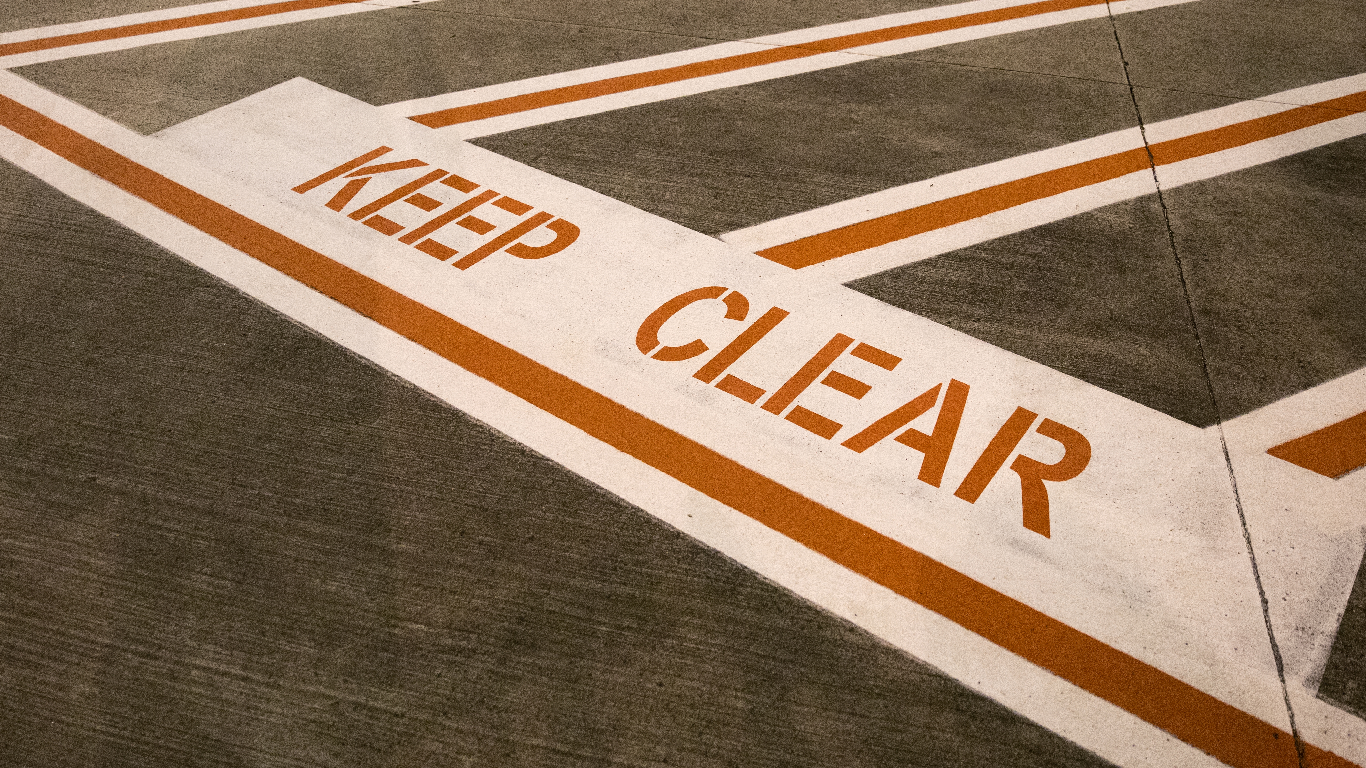 Keep clear sign on the ground