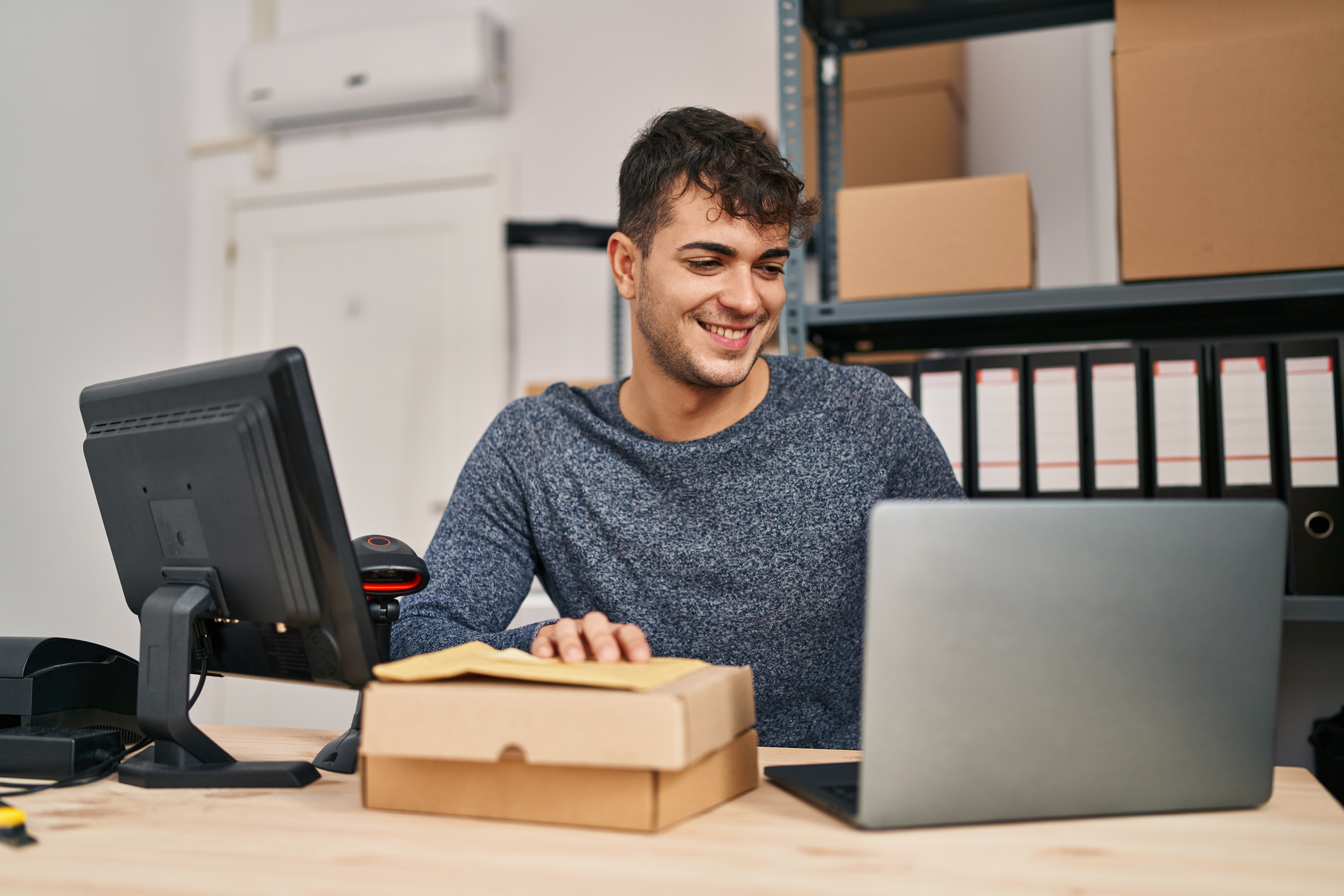 Man typing on laptop