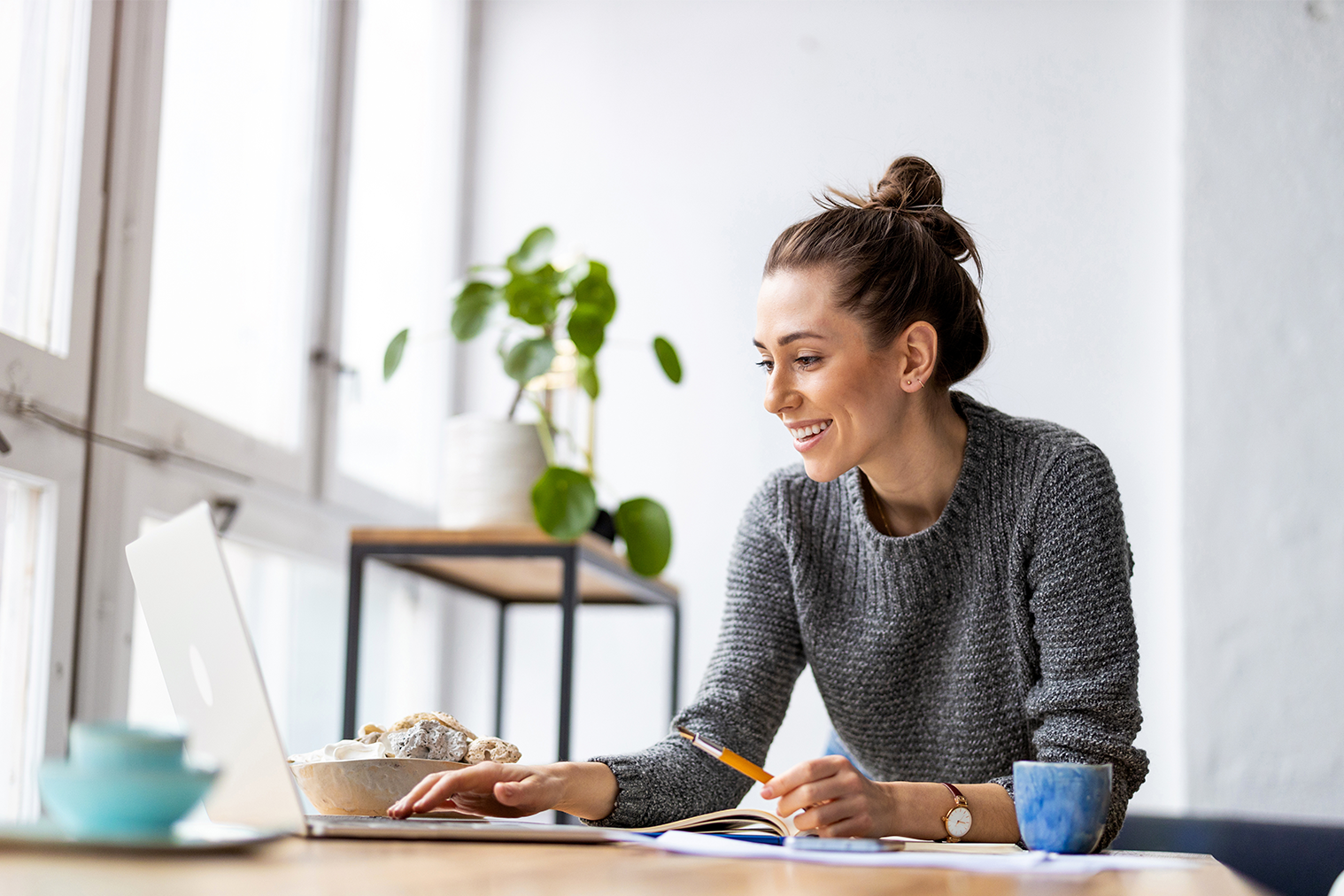 Woman using laptop in office