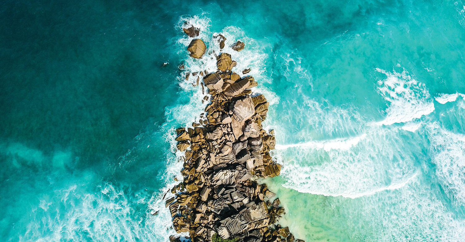 Aerial view of rocks near coastline