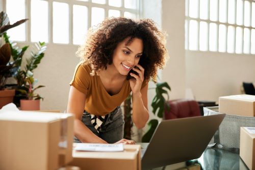 Woman on phone in office